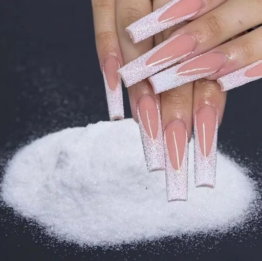 Lata de polvo de brillo para uñas para efecto azúcar.