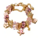 Brazalete dorado de flor de cerezo y estilo de mar.
